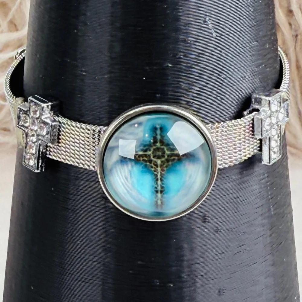 Silvertone Mesh Snap Bracelet with Blue Cross Design